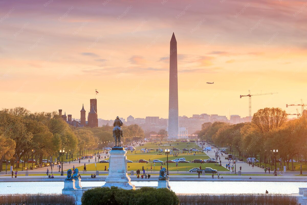 Washington, DC at orange sunset with the Washington Monument seen from the US Capitol