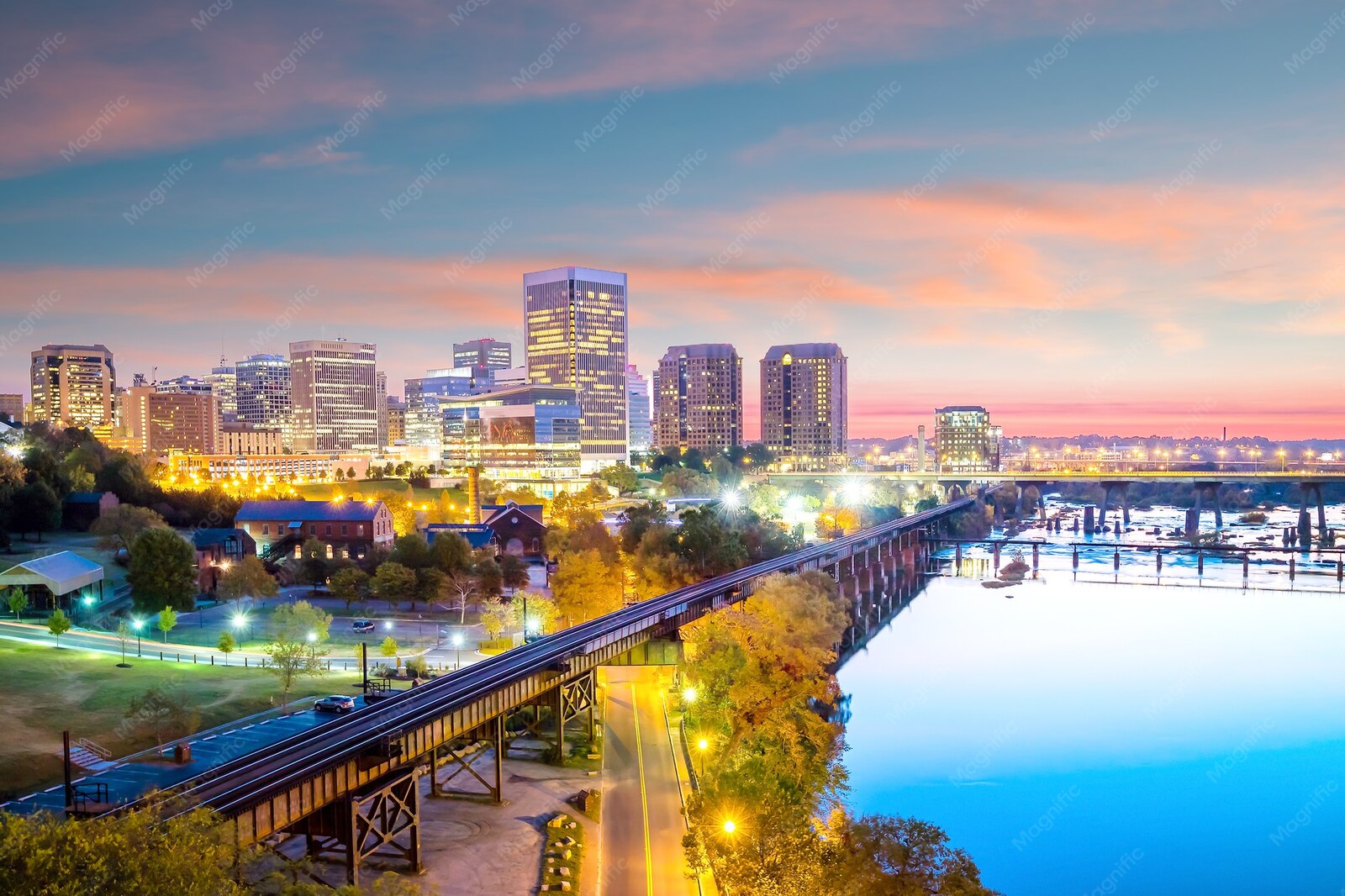 Downtown Richmond skyline above the James River at twilight