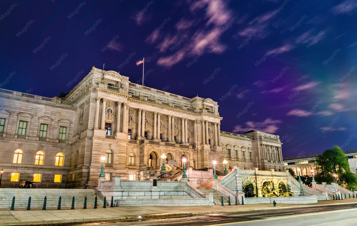 Library of Congress building on Capitol Hill lit up at night in Washington, DC