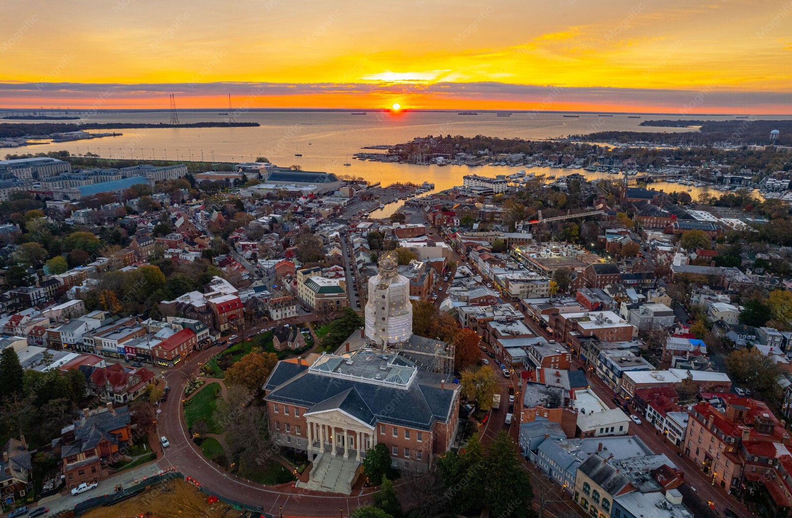 Aerial view of Annapolis harbor and the Maryland State House at sunset